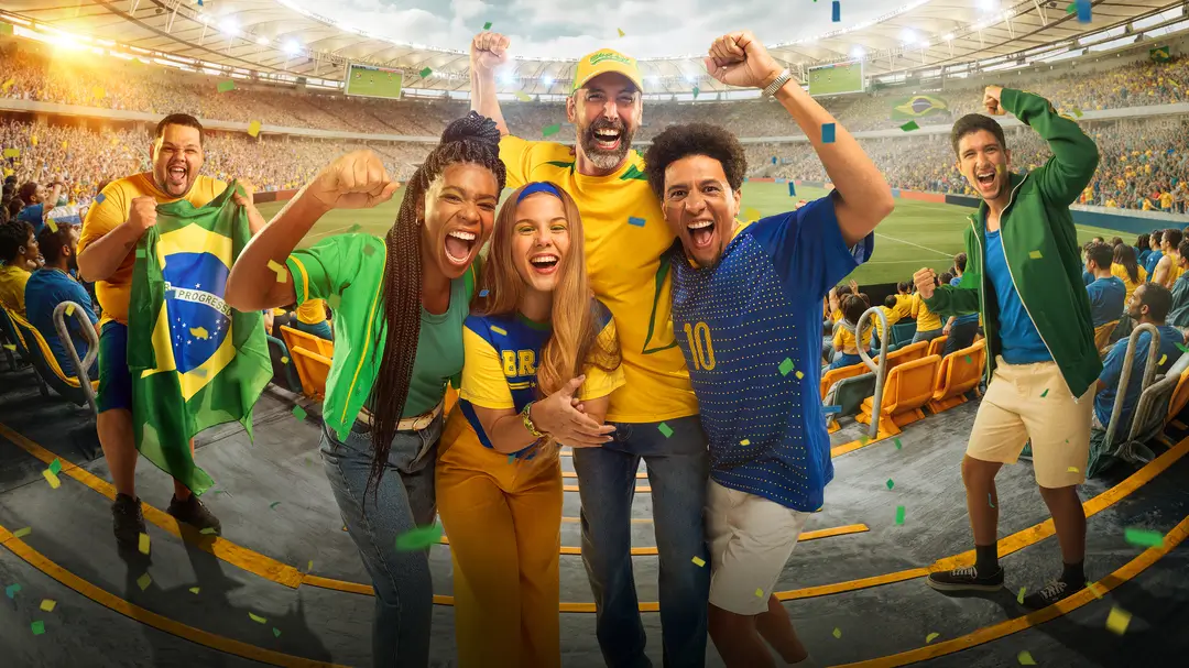 Fans cheering at a Brazilian stadium during the World Cup